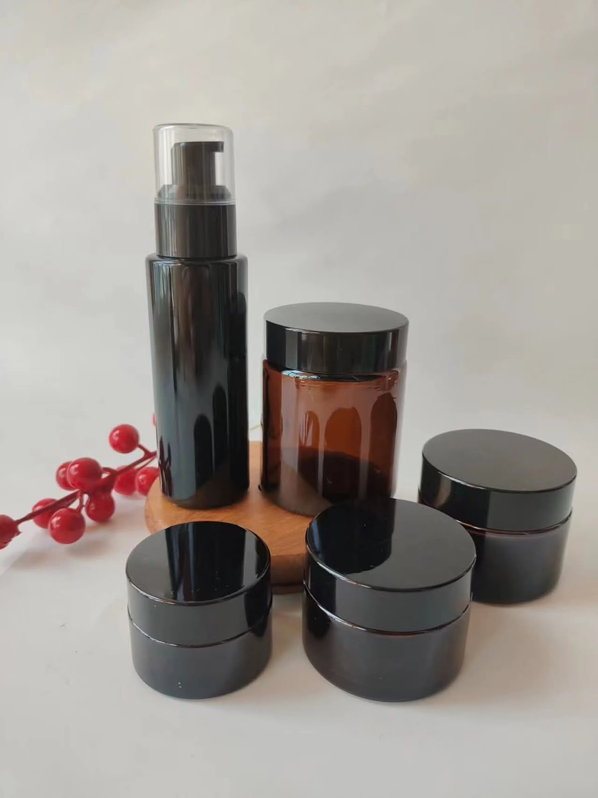 Premium Black Cosmetic Packaging Set | Pump Bottle & Cream Jar Collection